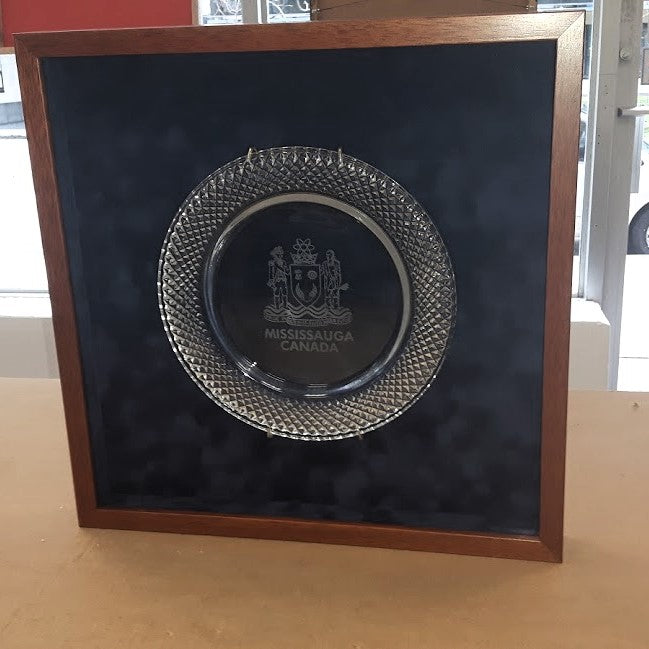Engraved crystal presentation plate custom framed in blue suede shadowbox with wood frame by Framing & Display.