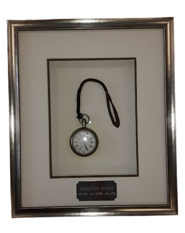Framed vintage Hamilton pocket watch with engraved nameplate in custom deep mat display by Framing & Display.