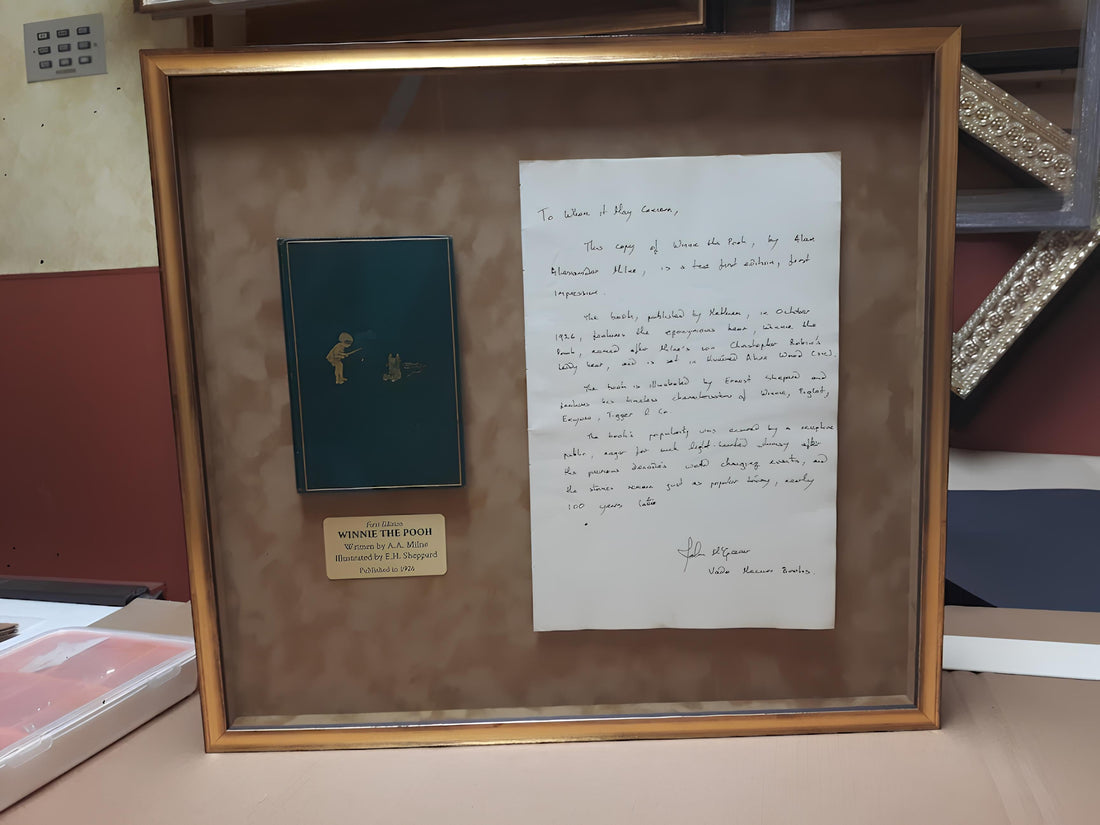 First edition Winnie the Pooh book and handwritten letter custom shadowbox framed with archival matting by Framing & Display